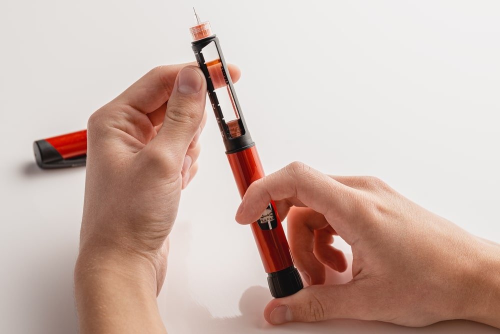 Priming an insulin pen