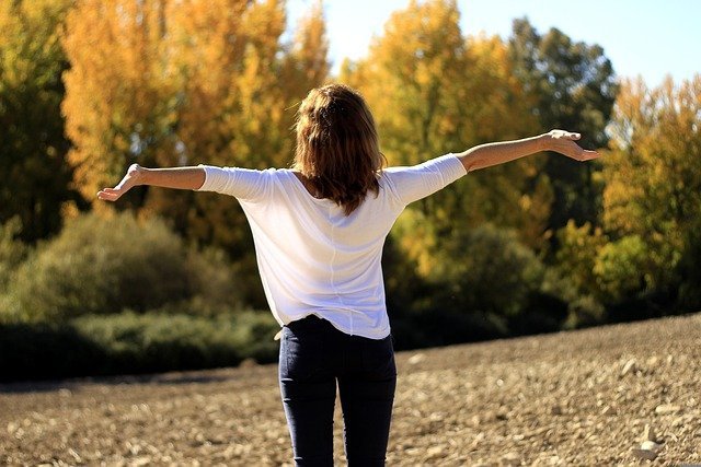 Woman breathing in nature with asthma